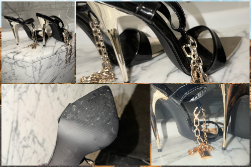 Getragene schwarze Lack-Heels mit Goldkette & Schloss