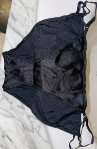 Dufthöschen-schwarzer, getragener Slip
