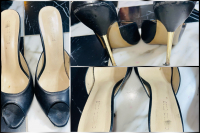 Getragene, schwarze Mules mit Metallabsatz
