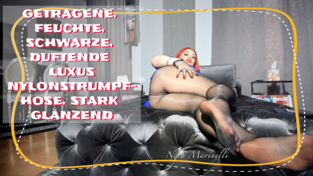 Getragene, stark glänzende Luxusstrumpfhose, schwarz