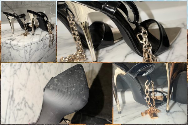 Getragene schwarze Lack-Heels mit Goldkette & Schloss